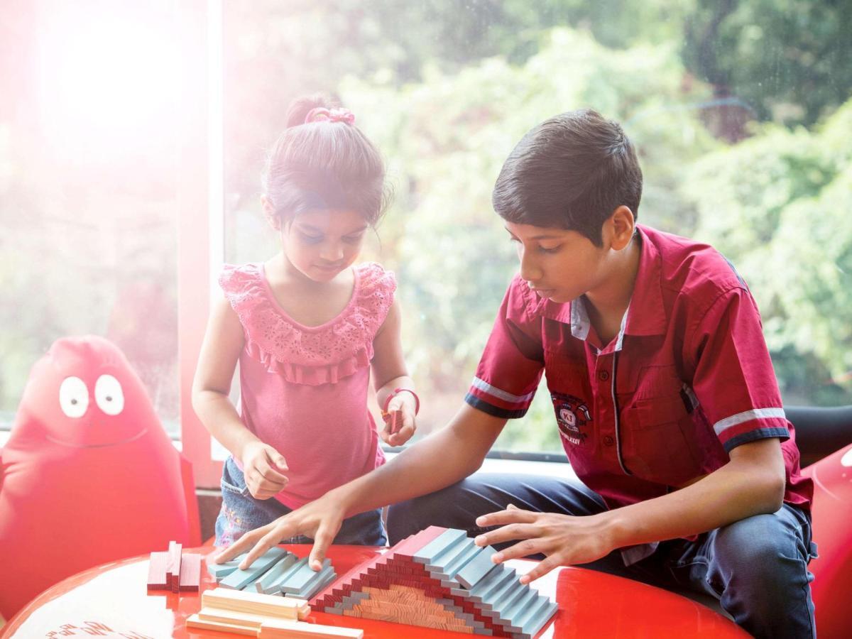 Novotel Chennai Sipcot Εξωτερικό φωτογραφία Children playing with the piano